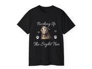 a black t - shirt with a dog's face and paw prints