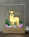 a glass block with a picture of a llama