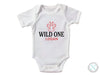 a white bodysuit with the words wild one on it