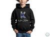 a young boy wearing a black hoodie with the letter k on it