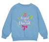 a blue sweatshirt with a pink bow on it