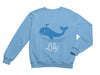 a blue sweatshirt with a picture of a whale on it